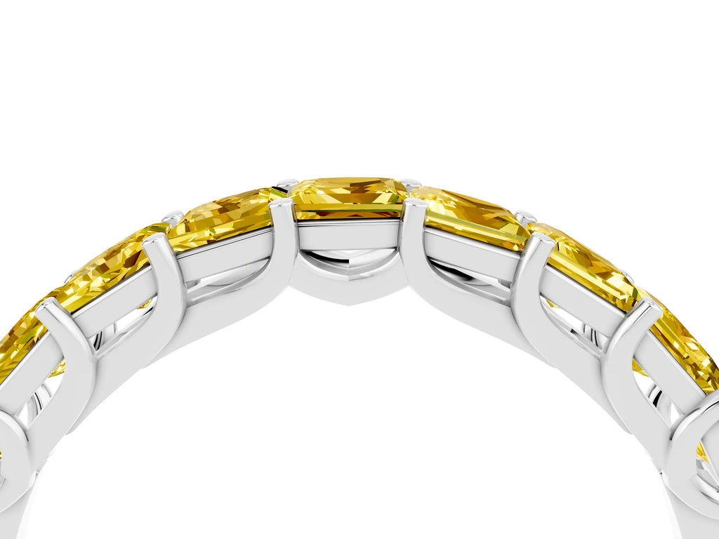 Princess Cut Yellow Sapphire Eternity Band in Silver with Channel Setting and Prong Detail