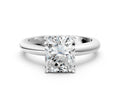 Radiant Cut Diamond Solitaire Ring in Platinum with Prong Setting and Rounded Band