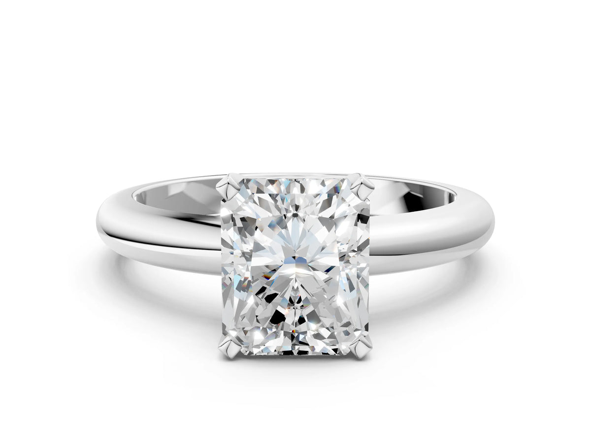 Radiant Cut Diamond Solitaire Ring in Platinum with Prong Setting and Rounded Band