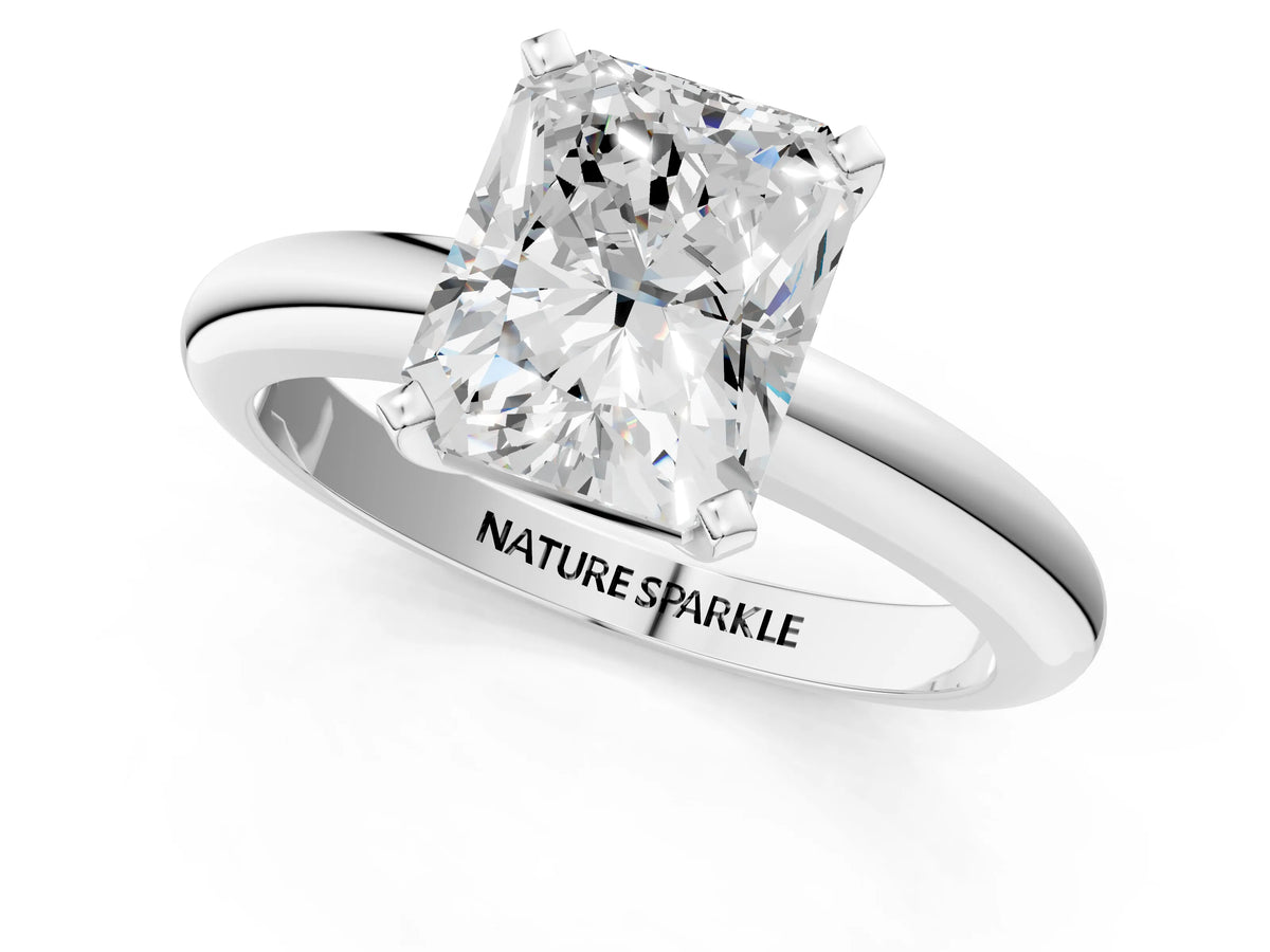 Radiant Cut Diamond Solitaire Ring in White gold with Prong Setting and Rounded Band