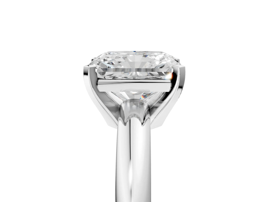 Radiant Cut Diamond Solitaire Ring in Platinum with Prong Setting and Rounded Band