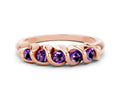 Round Amethyst Eternity Band in Rose gold with Twist Prong Setting 