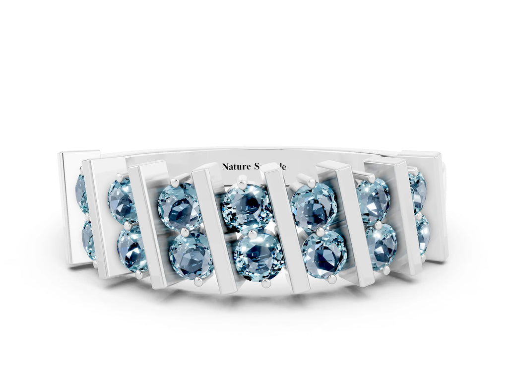 Round Aquamarine Anniversary Band in Silver with Channel Setting and Vertical Prongs