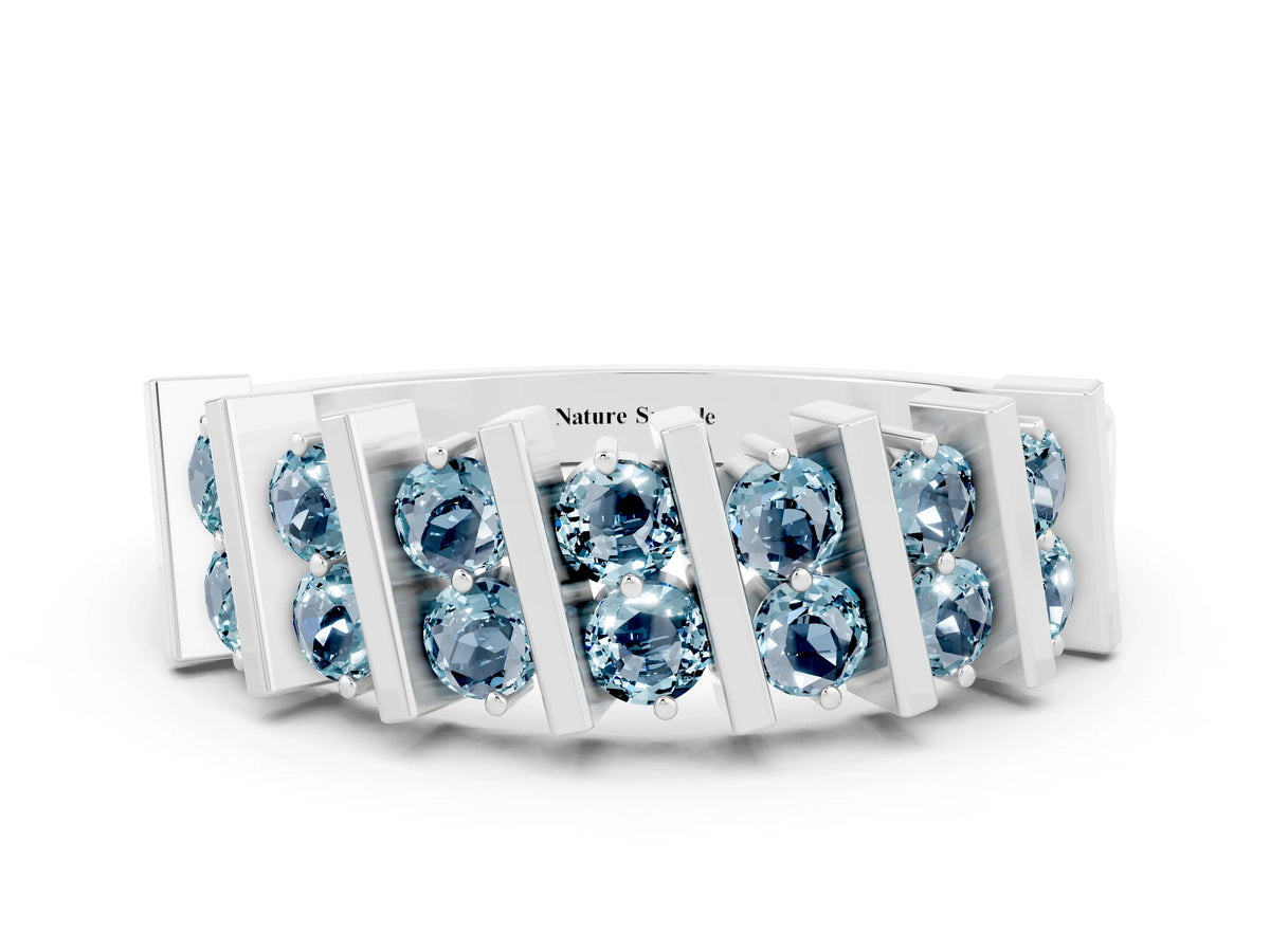 Round Aquamarine Anniversary Band in Silver with Channel Setting and Vertical Prongs