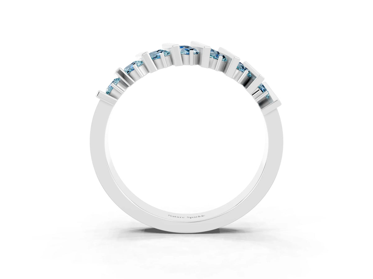 Round Aquamarine Anniversary Band in Silver with Channel Setting and Vertical Prongs