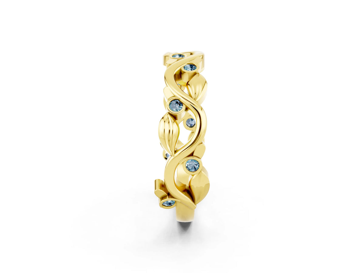 Round Aquamarine Leaf Motif Eternity Band in Yellow gold with Bezel Setting