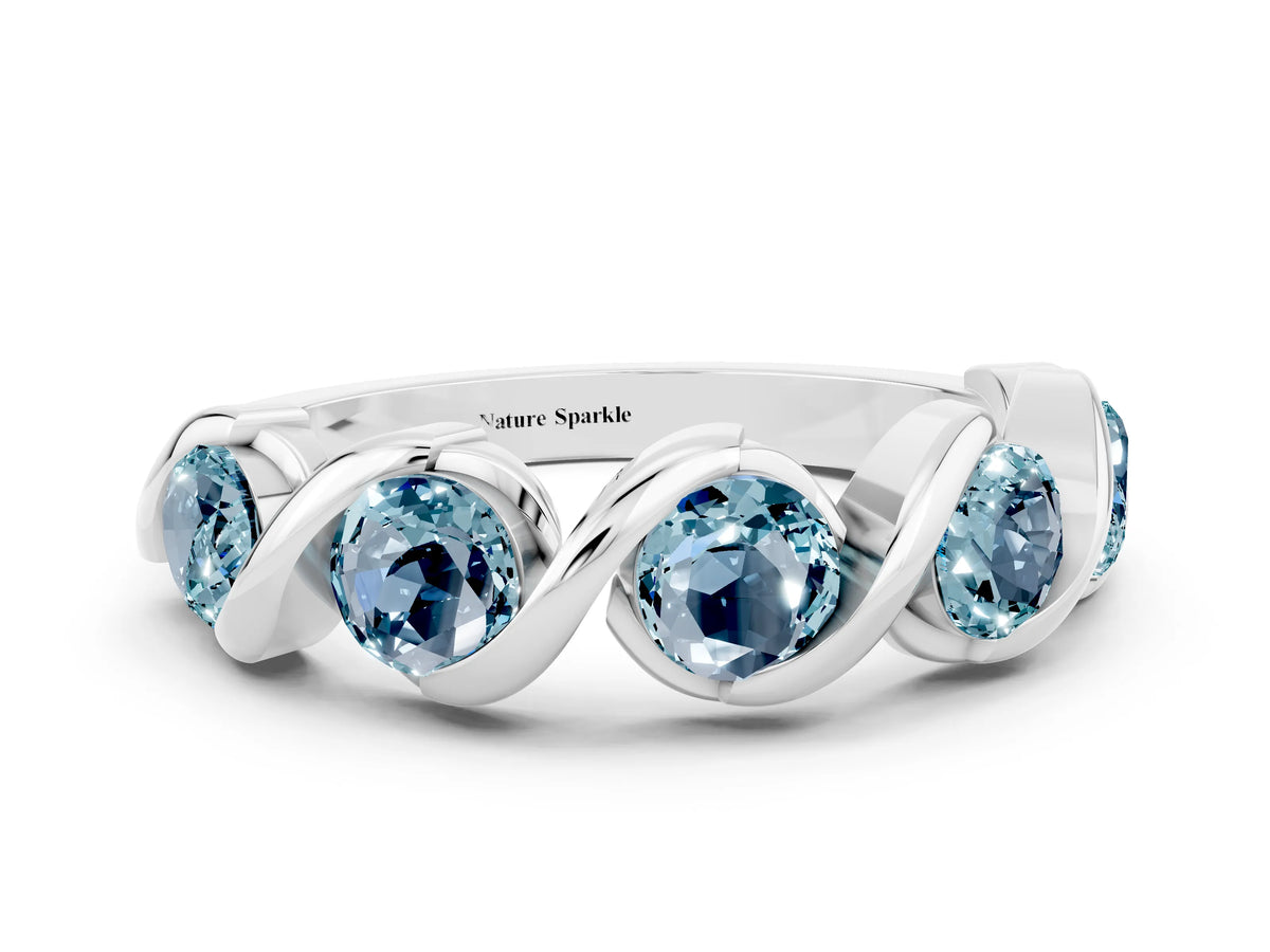 Round Aquamarine Wave Band in White gold with Channel Setting and Shared Prongs