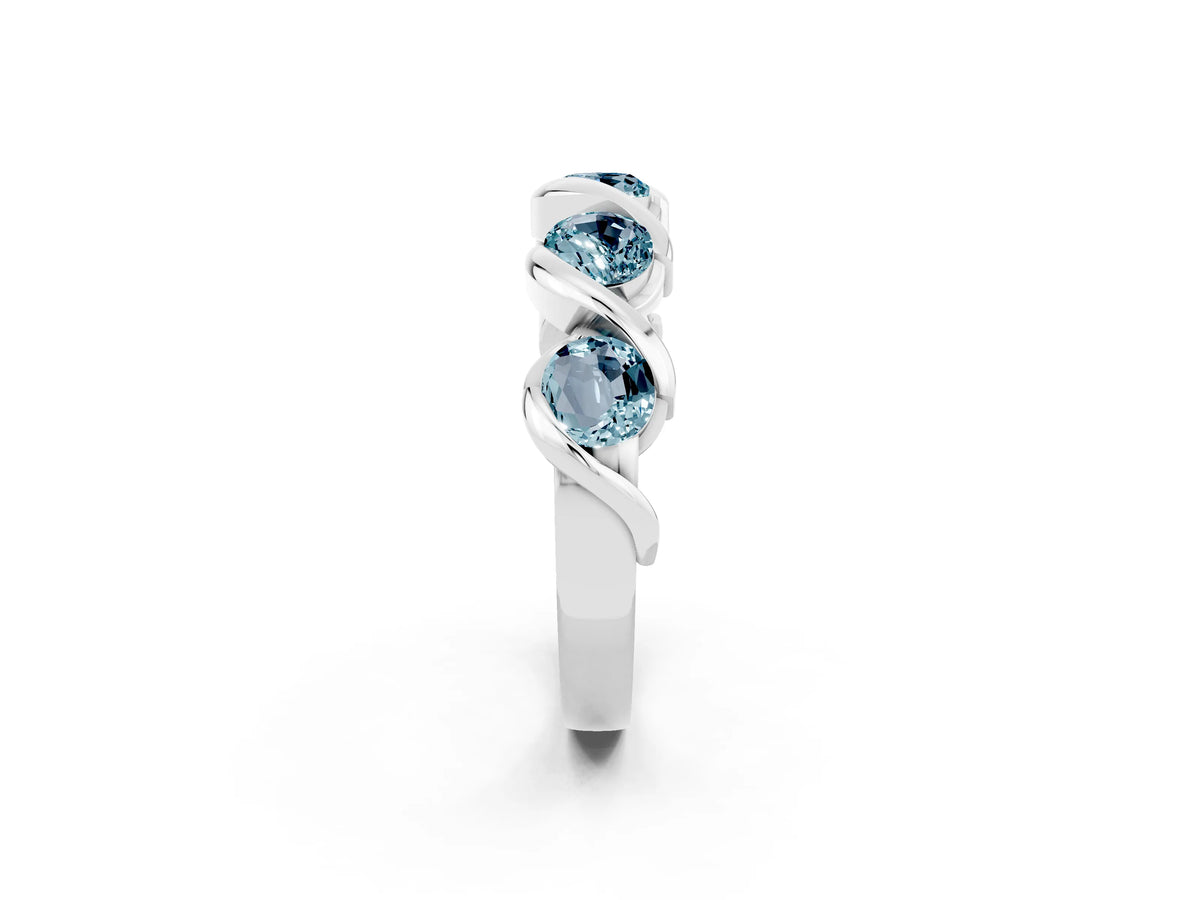Round Aquamarine Wave Band in White gold with Channel Setting and Shared Prongs