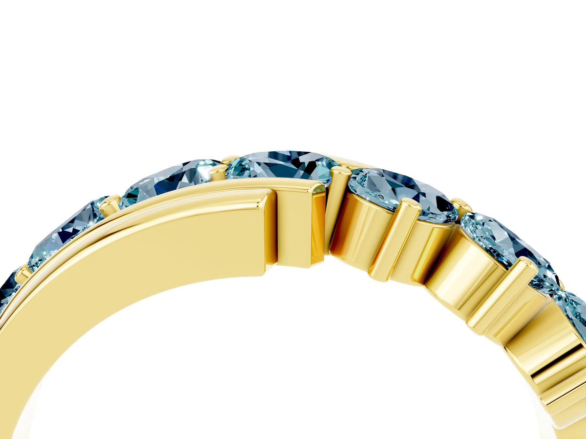 Round Aquamarine Wave Band in Yellow gold with Channel and Shared Prong Setting