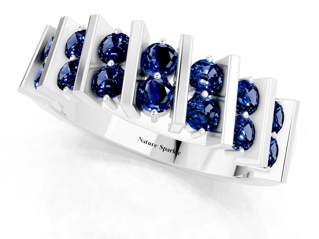 Round Blue Sapphire Anniversary Band in Platinum with Channel Setting and Vertical Prongs