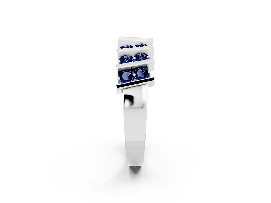 Round Blue Sapphire Anniversary Band in Platinum with Channel Setting and Vertical Prongs