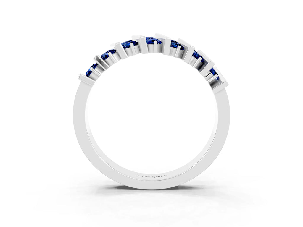 Round Blue Sapphire Anniversary Band in Platinum with Channel Setting and Vertical Prongs