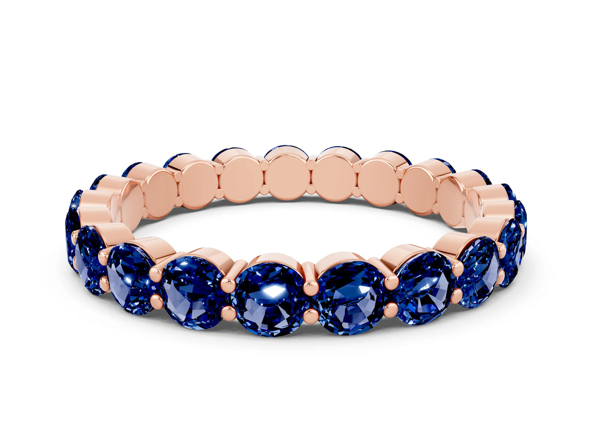 Round Blue Sapphire Eternity Band in Rose gold with U-Prong Setting