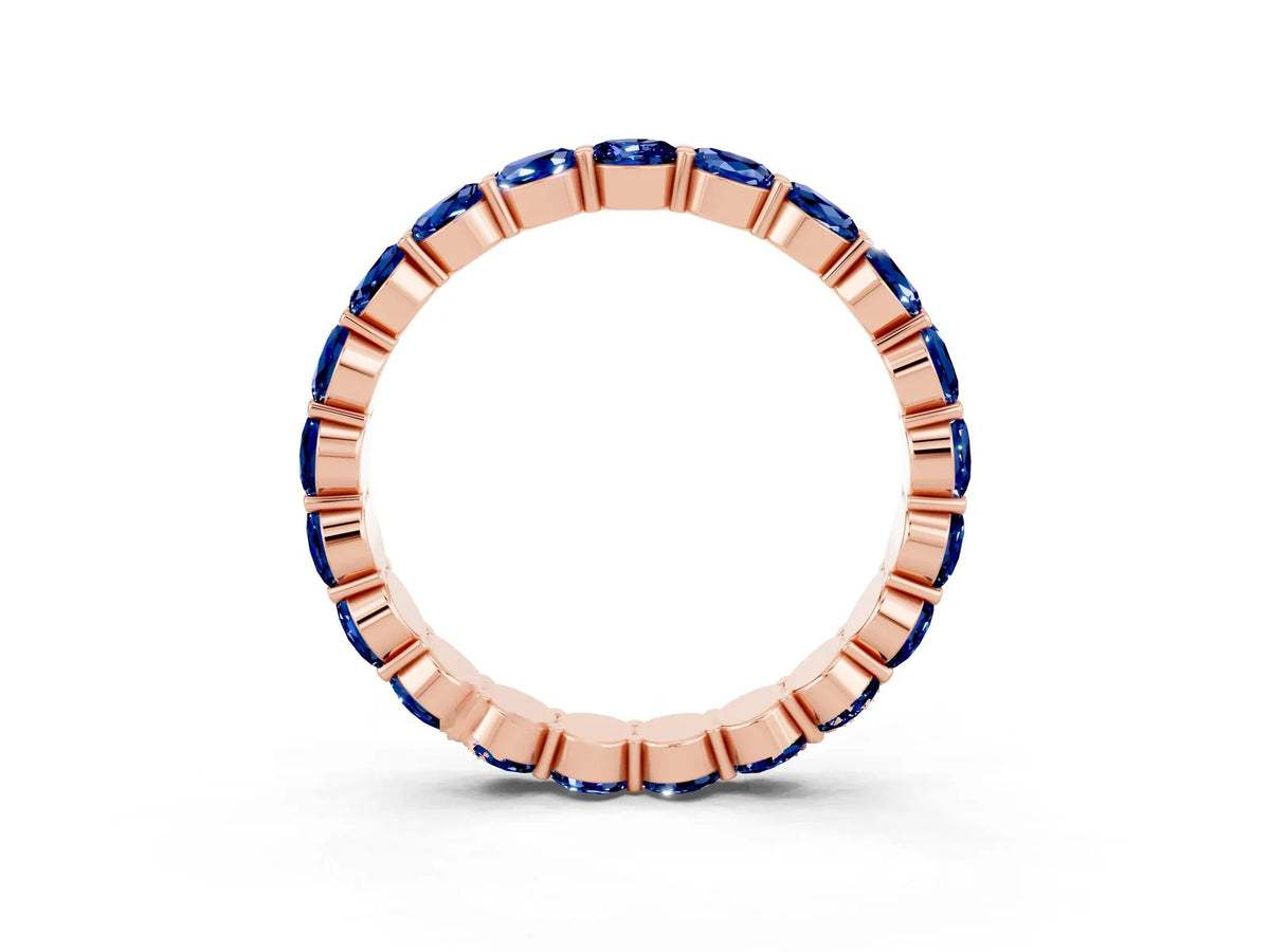 Round Blue Sapphire Eternity Band in Rose gold with U-Prong Setting 