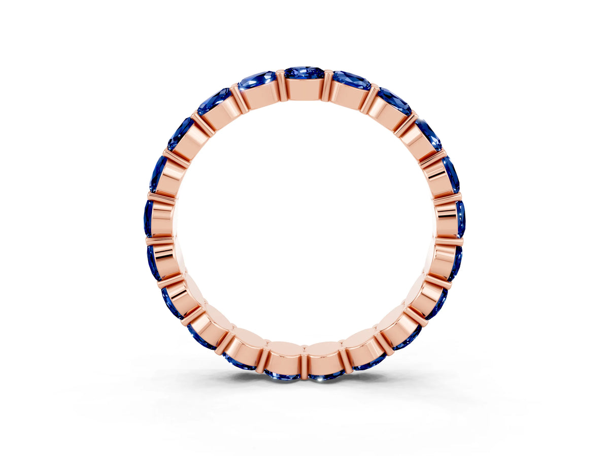 Round Blue Sapphire Eternity Band in Rose gold with U-Prong Setting