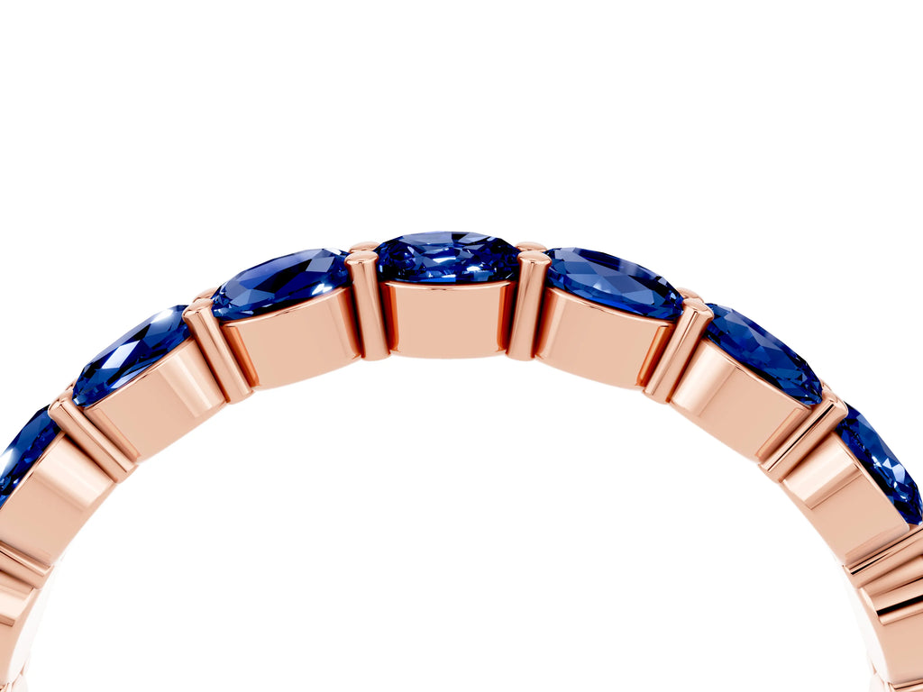 Round Blue Sapphire Eternity Band in Rose gold with U-Prong Setting