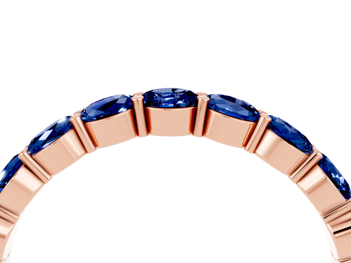Round Blue Sapphire Eternity Band in Rose gold with U-Prong Setting