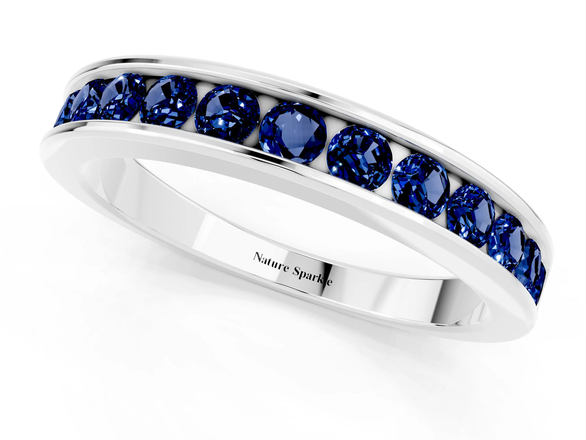 Round Blue Sapphire Eternity Band in Silver with Smooth Channel Setting