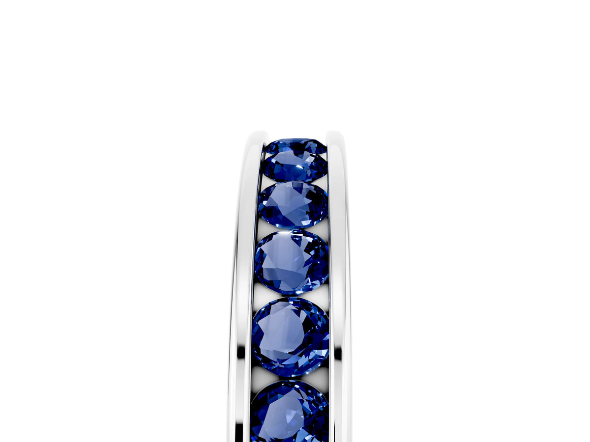 Round Blue Sapphire Eternity Band in Silver with Smooth Channel Setting