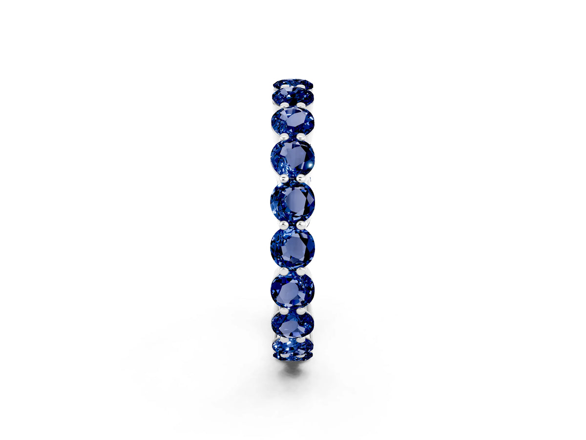 Round Blue Sapphire Eternity Band in Silver with U-Prong Setting