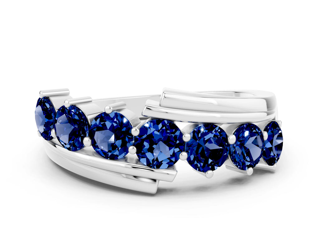 Round Blue Sapphire Wave Band in Silver with Channel and Shared Prong Setting