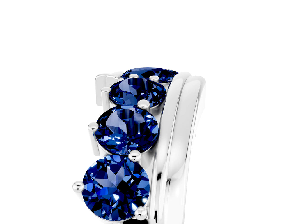Round Blue Sapphire Wave Band in Silver with Channel and Shared Prong Setting