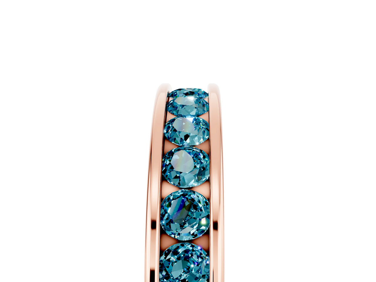 Round Blue Topaz Eternity Band in Rose gold with Smooth Channel Setting