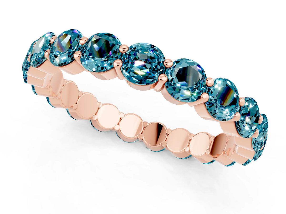 Round Blue Topaz Eternity Band in Rose gold with U-Prong Setting