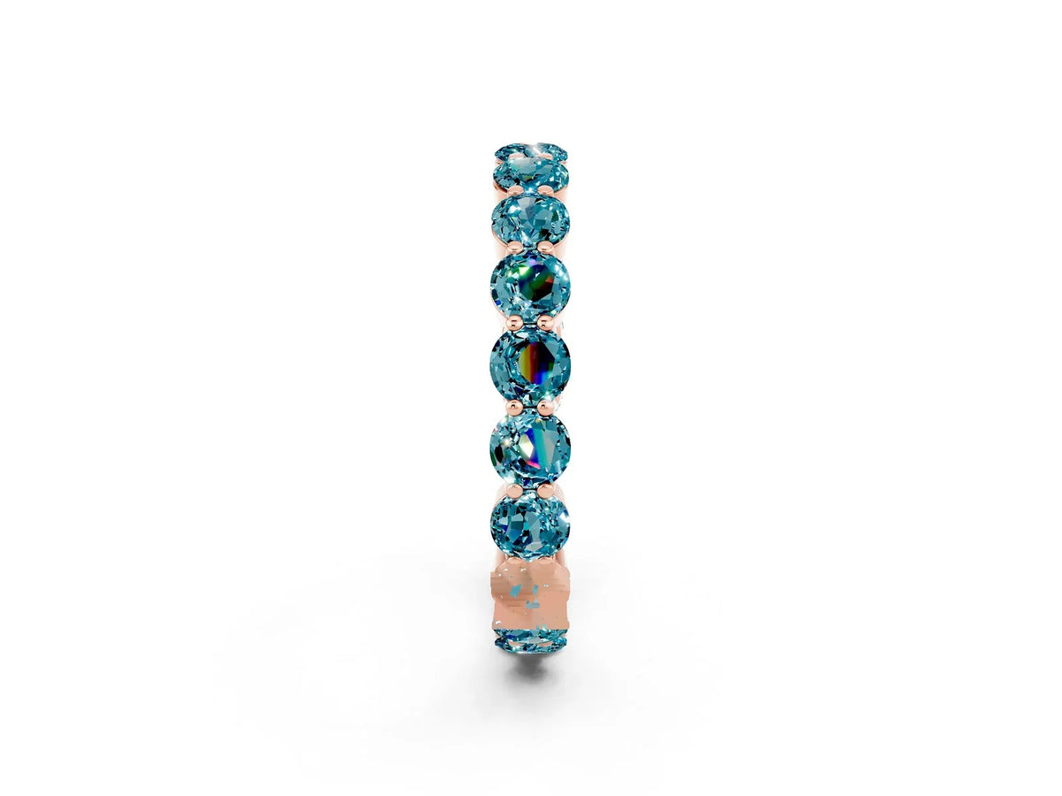 Round Blue Topaz Eternity Band in Rose gold with U-Prong Setting 