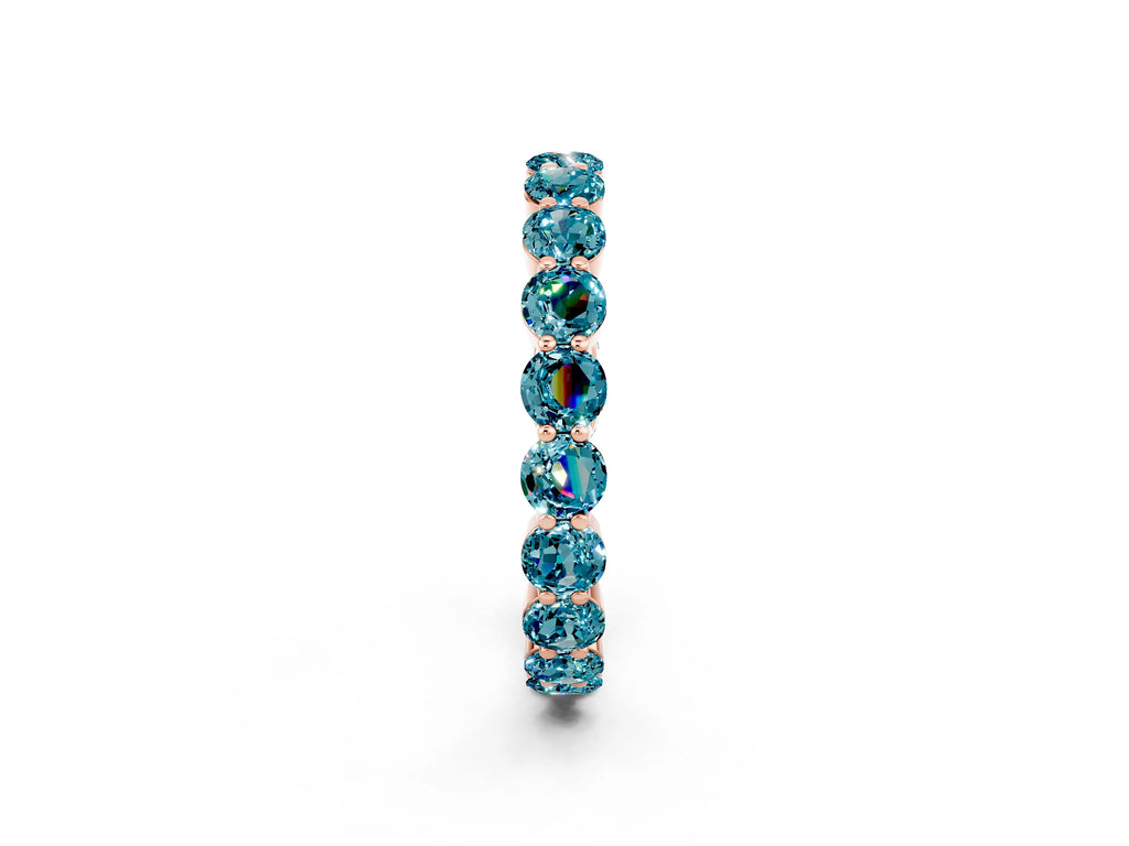 Round Blue Topaz Eternity Band in Rose gold with U-Prong Setting