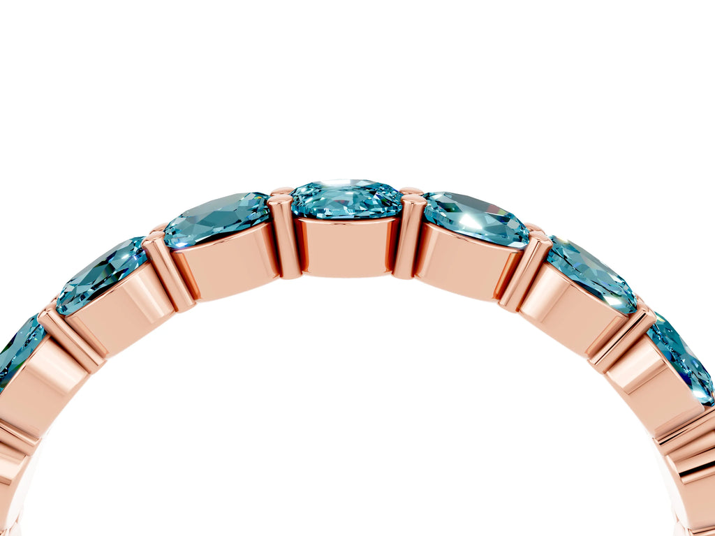 Round Blue Topaz Eternity Band in Rose gold with U-Prong Setting