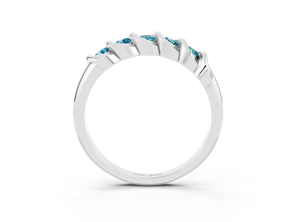 Round Blue Topaz Eternity Band in Silver with Twist Prong Setting