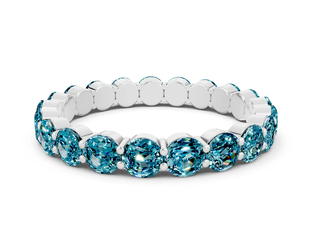 Round Blue Topaz Eternity Band in White gold with U-Prong Setting