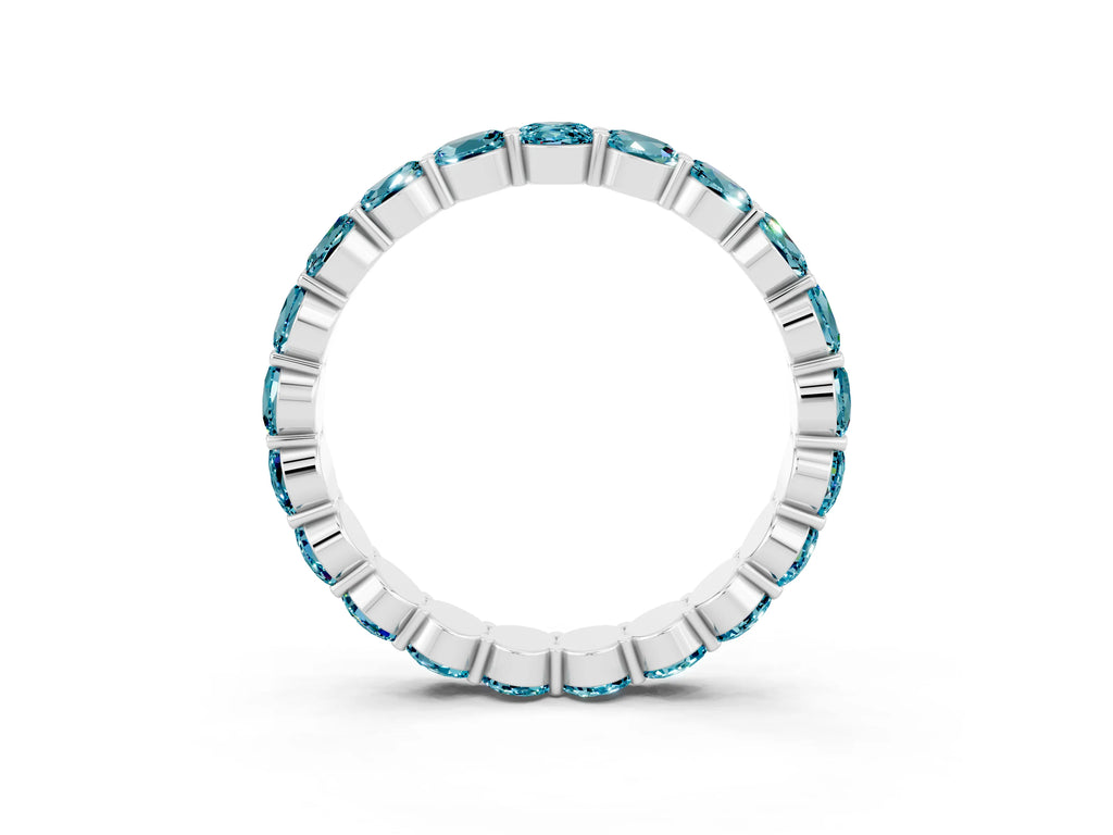Round Blue Topaz Eternity Band in White gold with U-Prong Setting