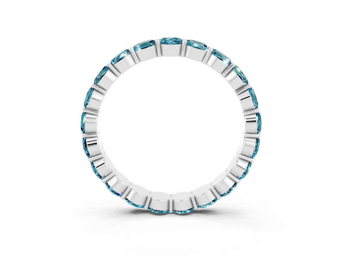 Round Blue Topaz Eternity Band in White gold with U-Prong Setting