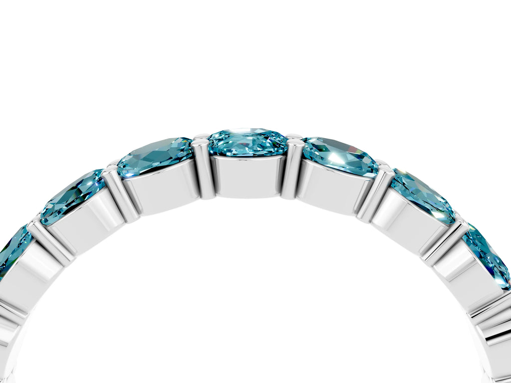 Round Blue Topaz Eternity Band in White gold with U-Prong Setting