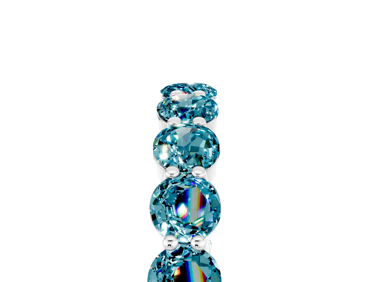Round Blue Topaz Eternity Band in White gold with U-Prong Setting