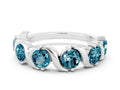 Round Blue Topaz Half Eternity Band in Silver with Wave Prong Setting 
