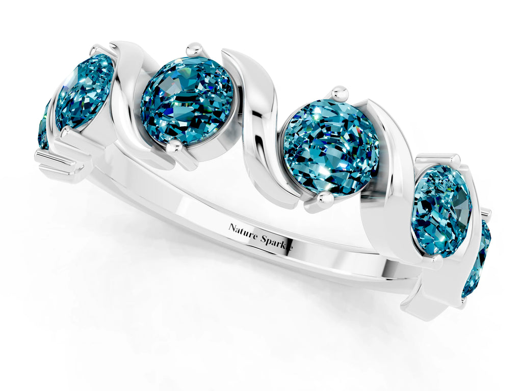 Round Blue Topaz Half Eternity Band in Silver with Wave Prong Setting