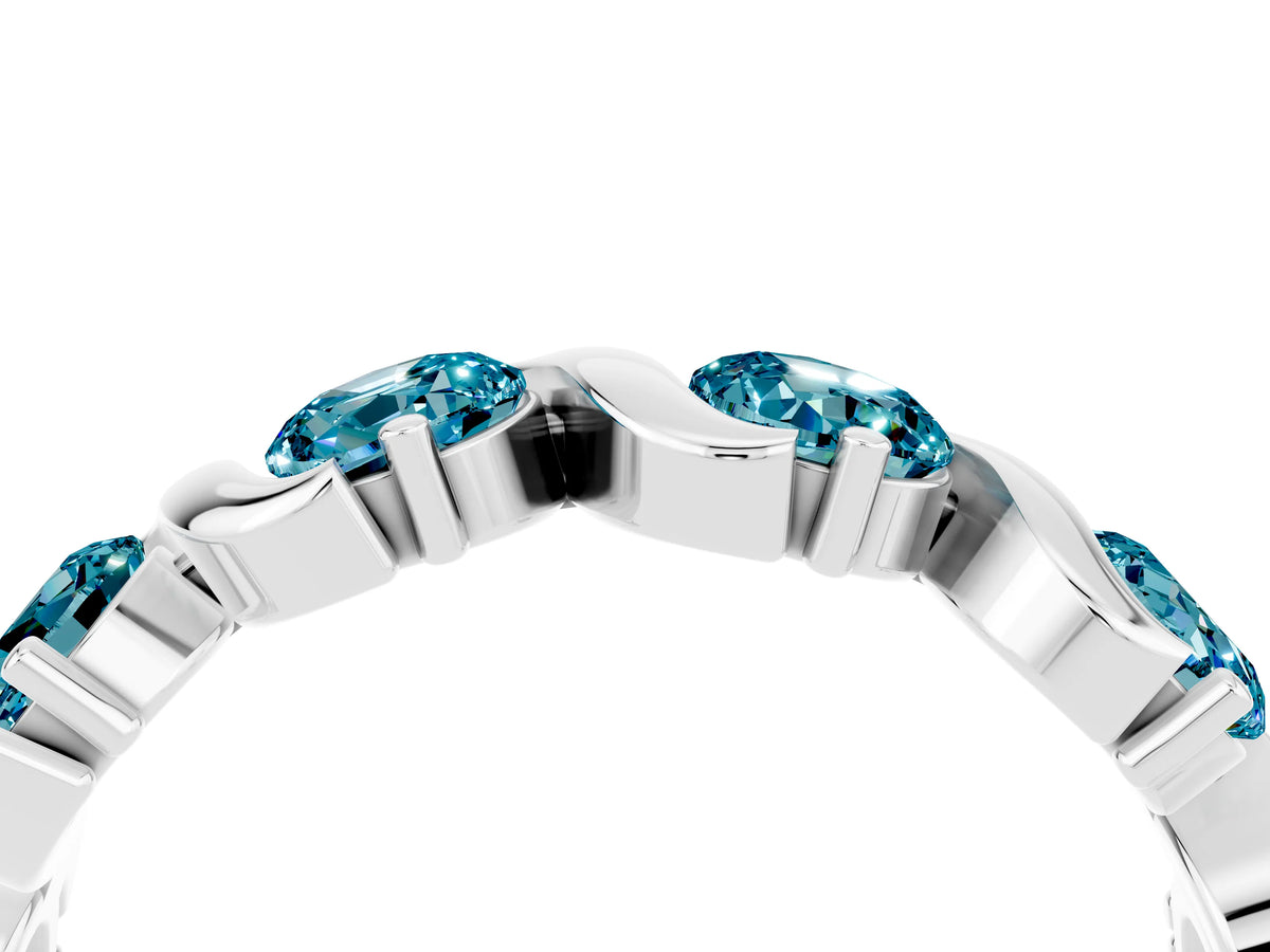 Round Blue Topaz Half Eternity Band in Silver with Wave Prong Setting
