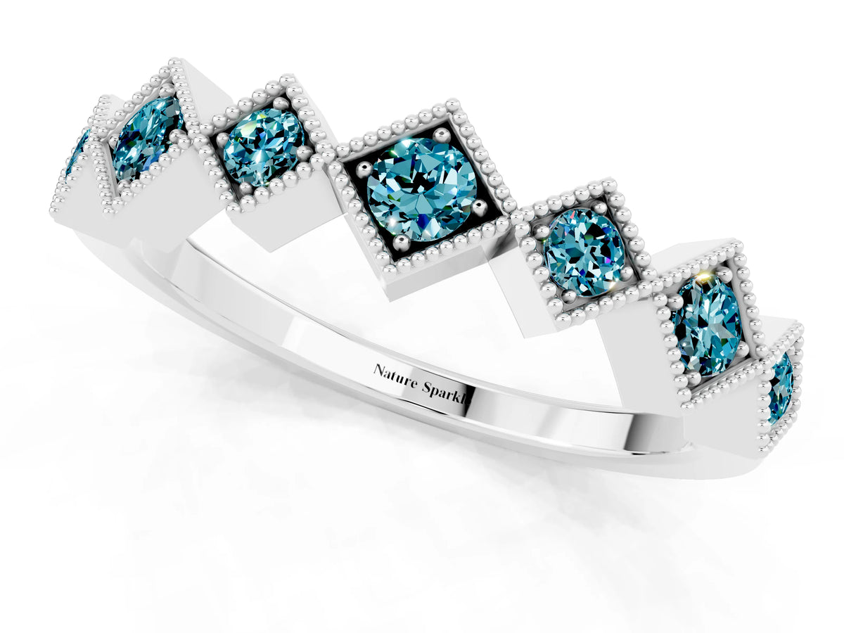 Round Blue Topaz Square Bezel Chevron Band in Platinum with Milgrain Detailing