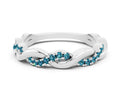 Round Blue Topaz Twist Eternity Band in White gold with Pavé Setting