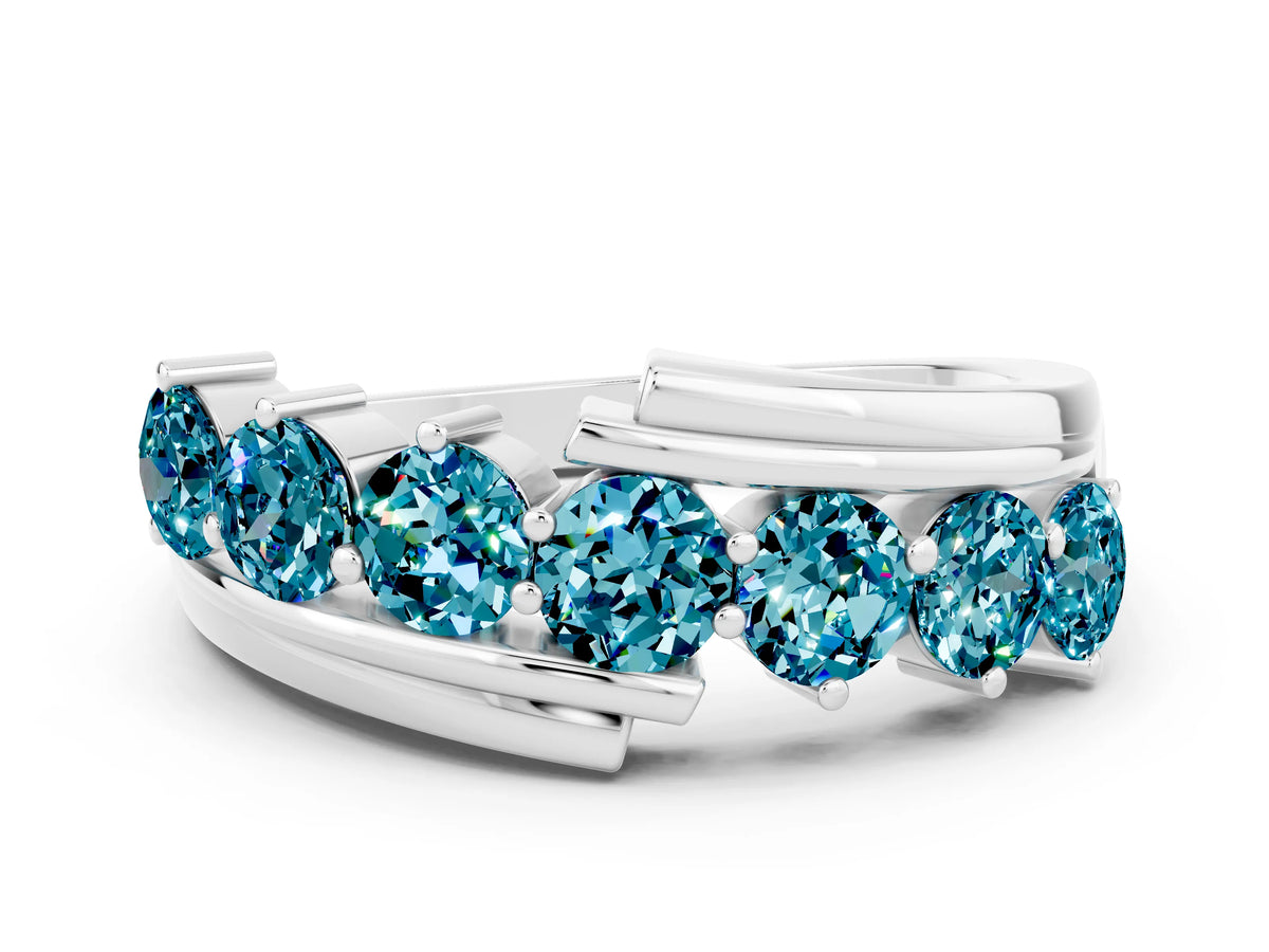 Round Blue Topaz Wave Band in Silver with Channel and Shared Prong Setting