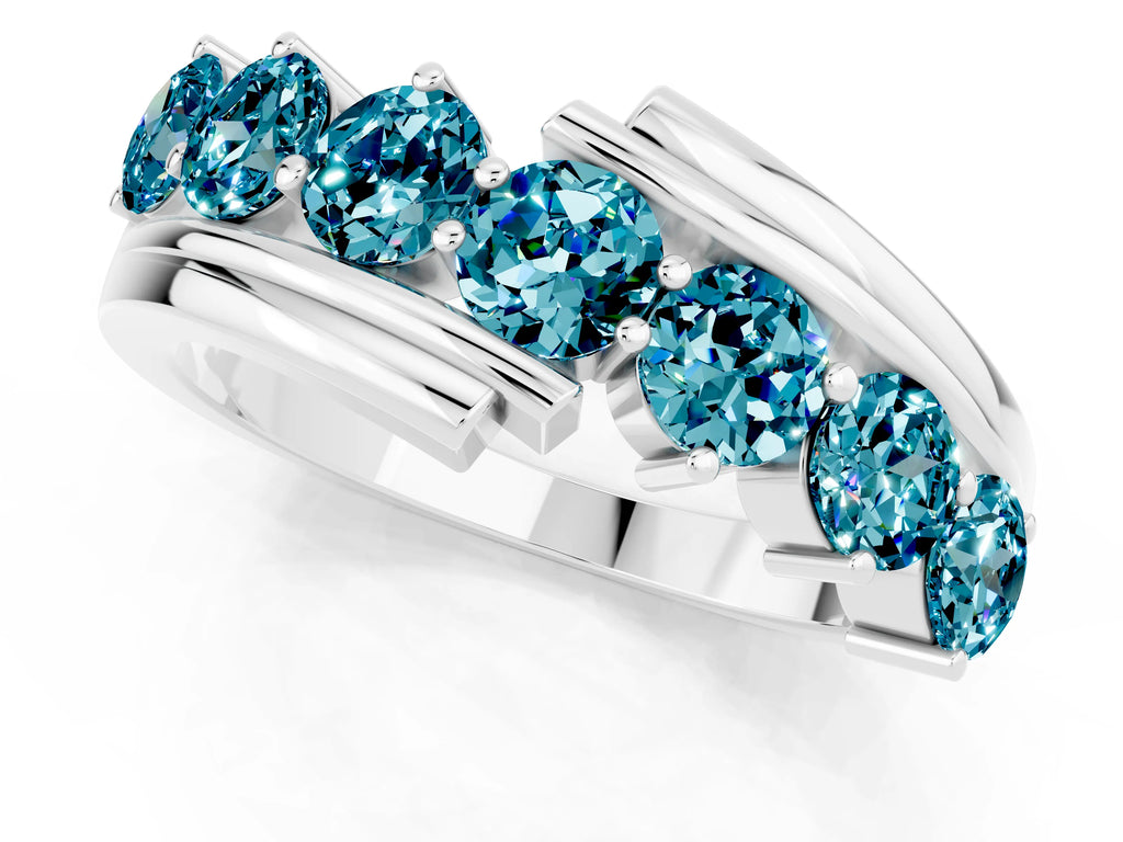 Round Blue Topaz Wave Band in Silver with Channel and Shared Prong Setting