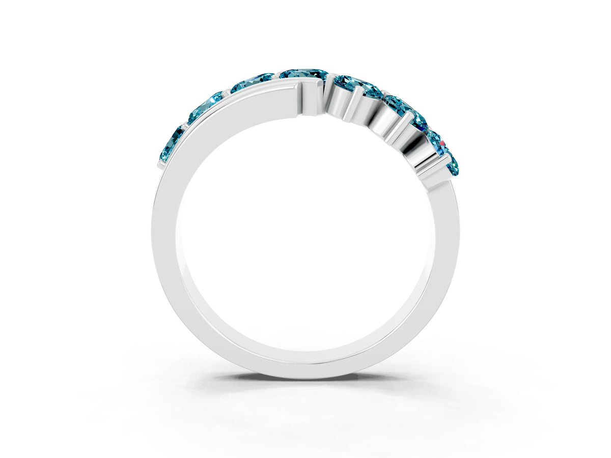 Round Blue Topaz Wave Band in Silver with Channel and Shared Prong Setting