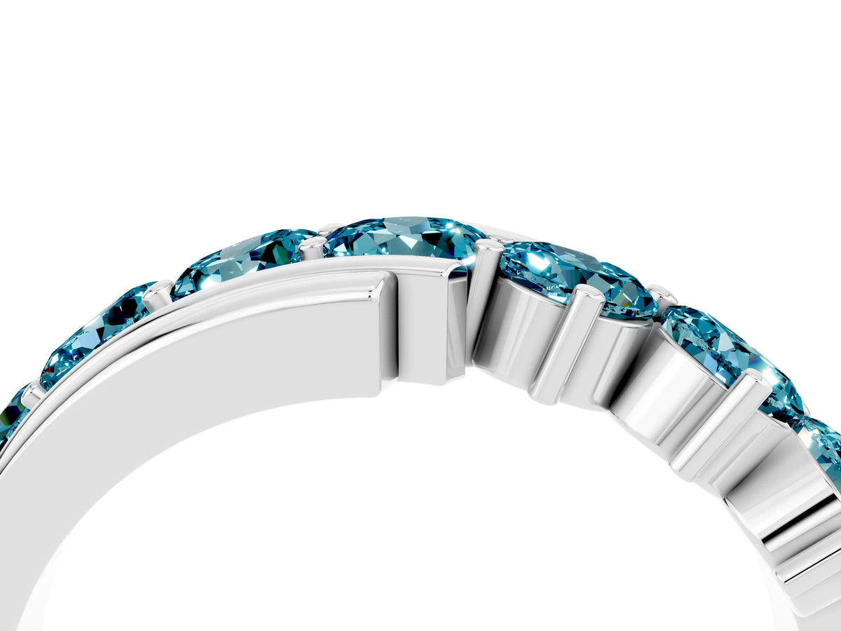 Round Blue Topaz Wave Band in Silver with Channel and Shared Prong Setting
