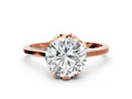 Round Cut Diamond Solitaire Ring in Rose gold with Flower Prong Setting
