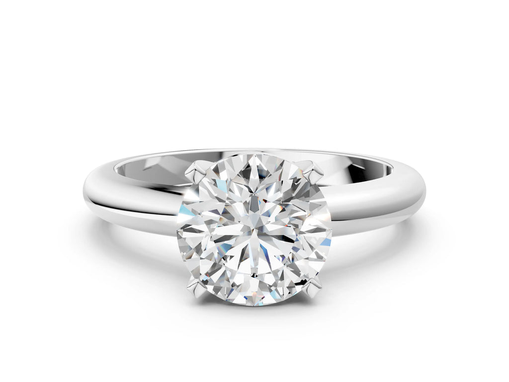 Round Cut Diamond Solitaire Ring in Silver with Prong Setting and Rounded Band