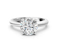 Round Cut Diamond Solitaire Ring in White gold with Prong Setting and Rounded Band