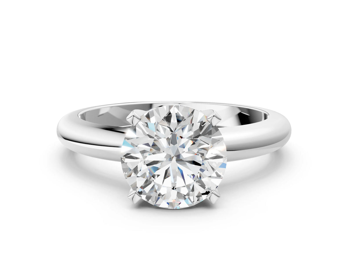 Round Cut Diamond Solitaire Ring in White gold with Prong Setting and Rounded Band